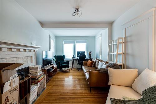 42 Balsam Avenue N, Hamilton, ON - Indoor Photo Showing Living Room With Fireplace