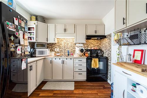 42 Balsam Avenue N, Hamilton, ON - Indoor Photo Showing Kitchen With Double Sink