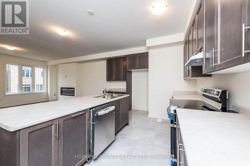 65 Donald Ficht Crescent, Brampton (Northwest Brampton), ON - Indoor Photo Showing Kitchen With Double Sink