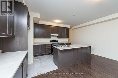 65 Donald Ficht Crescent, Brampton (Northwest Brampton), ON - Indoor Photo Showing Kitchen With Double Sink