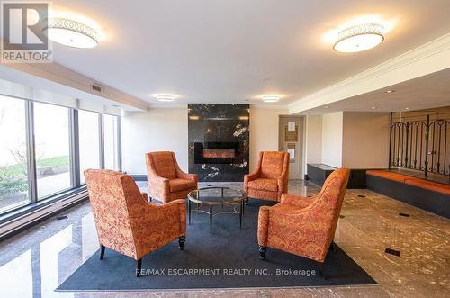 1512 - 500 Green Road, Hamilton, ON - Indoor Photo Showing Living Room With Fireplace