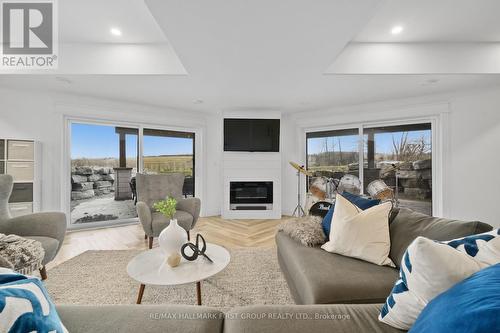 1640 Joe Oliver Road, Hamilton Township, ON - Indoor Photo Showing Living Room With Fireplace