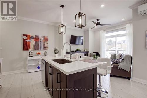 102 - 257 Millen Road, Hamilton (Stoney Creek), ON - Indoor Photo Showing Kitchen