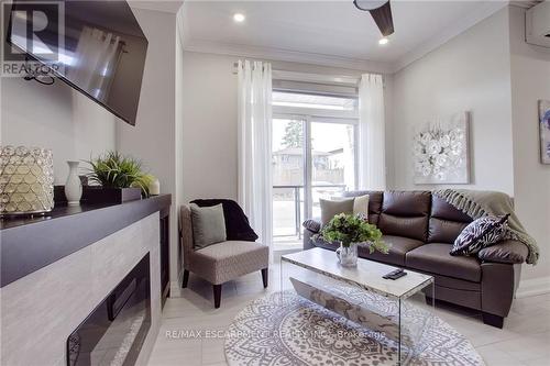 102 - 257 Millen Road, Hamilton (Stoney Creek), ON - Indoor Photo Showing Living Room