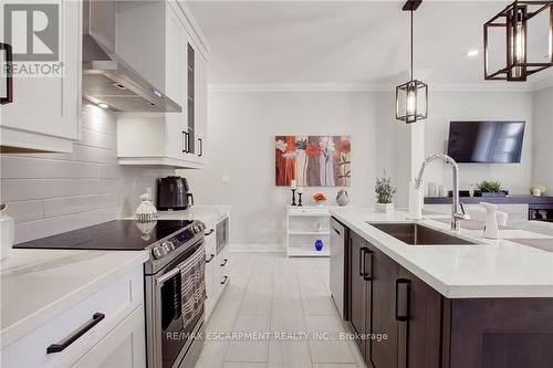 102 - 257 Millen Road, Hamilton (Stoney Creek), ON - Indoor Photo Showing Kitchen