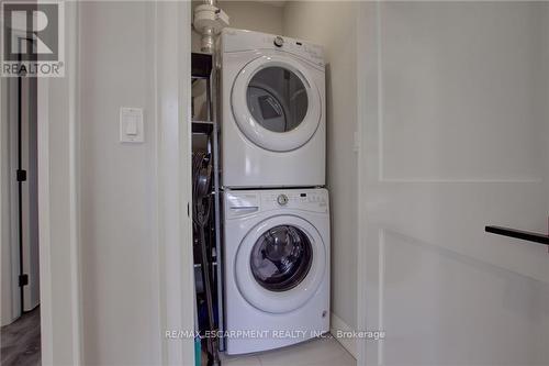 102 - 257 Millen Road, Hamilton (Stoney Creek), ON - Indoor Photo Showing Laundry Room