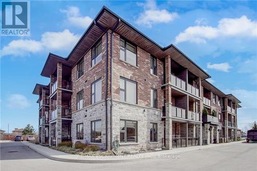 102 - 257 Millen Road, Hamilton (Stoney Creek), ON - Outdoor With Facade