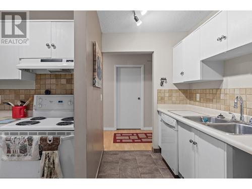 1035 Bernard Avenue Unit# 108, Kelowna, BC - Indoor Photo Showing Kitchen With Double Sink
