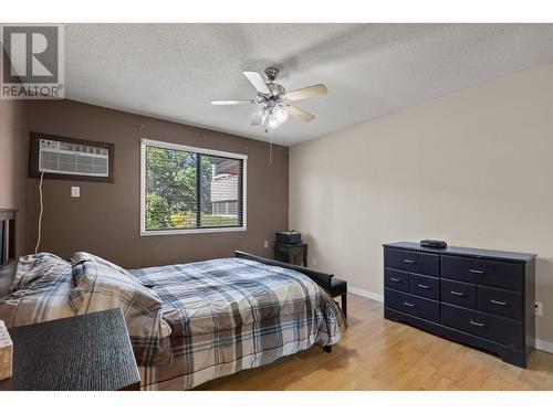 1035 Bernard Avenue Unit# 108, Kelowna, BC - Indoor Photo Showing Bedroom