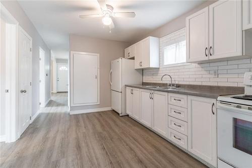 Additional pantry space behind white door! - 135 Mcanulty Boulevard, Hamilton, ON - Indoor Photo Showing Kitchen