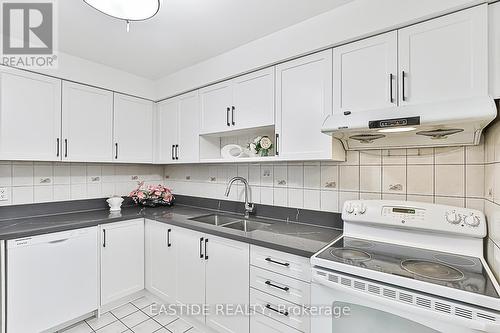 13 - 5021 Sheppard Avenue E, Toronto, ON - Indoor Photo Showing Kitchen With Double Sink