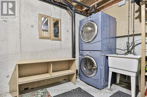 13 - 5021 Sheppard Avenue E, Toronto, ON - Indoor Photo Showing Laundry Room