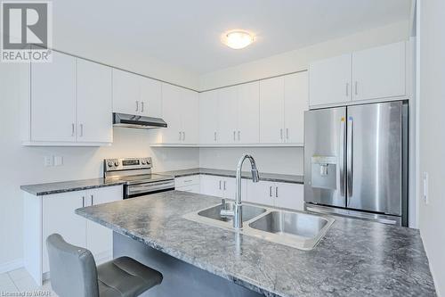 143 Eva Drive, Breslau, ON - Indoor Photo Showing Kitchen With Double Sink With Upgraded Kitchen