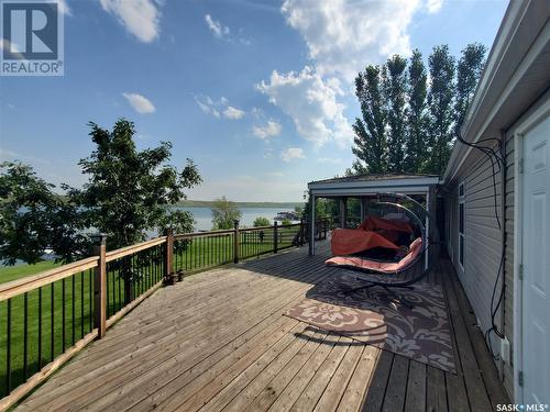 Merilee Way, Rock Ridge Rv Resort, Webb Rm No. 138, SK - Outdoor With Body Of Water With Deck Patio Veranda With Exterior