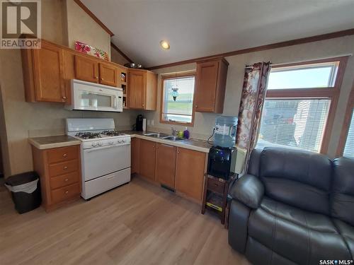 Merilee Way, Rock Ridge Rv Resort, Webb Rm No. 138, SK - Indoor Photo Showing Kitchen With Double Sink