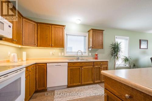 30 Aletha Drive, Prince Edward County (Wellington), ON - Indoor Photo Showing Kitchen With Double Sink