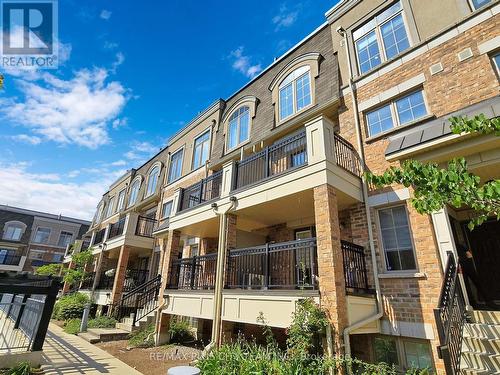 122 - 2441 Greenwich Drive, Oakville, ON - Outdoor With Balcony With Facade