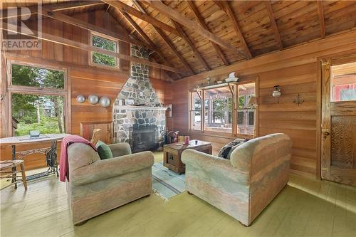 Wabewaba Island Island, Petawawa, ON - Indoor Photo Showing Living Room With Fireplace