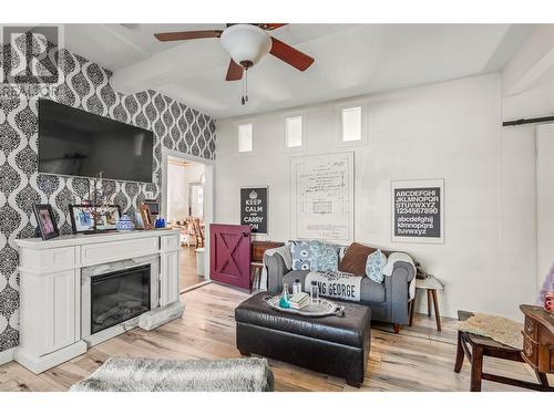 3408 33Rd Avenue, Vernon, BC - Indoor Photo Showing Living Room With Fireplace