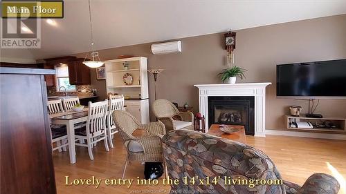 21 Christopher Cres, Moncton, NB - Indoor Photo Showing Living Room With Fireplace