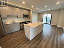 1411 - 15 Queen Street S, Hamilton, ON  - Indoor Photo Showing Kitchen With Stainless Steel Kitchen With Double Sink 