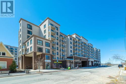 302 - 2486 Old Bronte Road, Oakville, ON - Outdoor With Facade