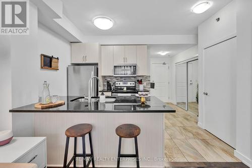 302 - 2486 Old Bronte Road, Oakville, ON - Indoor Photo Showing Kitchen With Stainless Steel Kitchen With Upgraded Kitchen