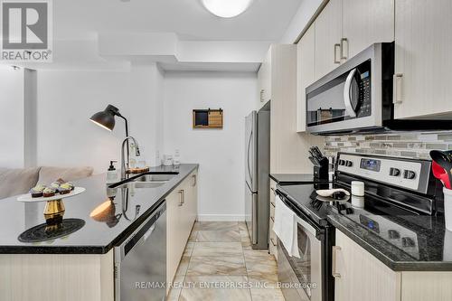 302 - 2486 Old Bronte Road, Oakville, ON - Indoor Photo Showing Kitchen With Stainless Steel Kitchen With Double Sink With Upgraded Kitchen