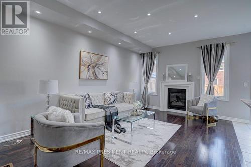 17 Zamek Street, Brampton, ON - Indoor Photo Showing Living Room With Fireplace