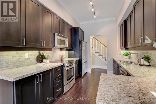 101 - 9 Burnhamthorpe Crescent, Toronto, ON - Indoor Photo Showing Kitchen With Upgraded Kitchen