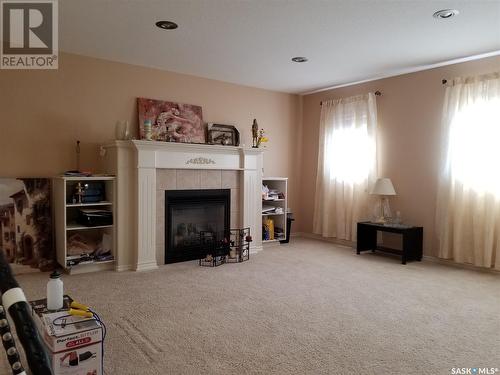 2319 Riverbend Crescent, Regina, SK - Indoor With Fireplace