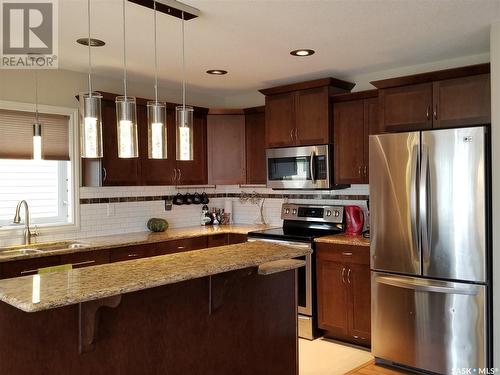 2319 Riverbend Crescent, Regina, SK - Indoor Photo Showing Kitchen With Upgraded Kitchen