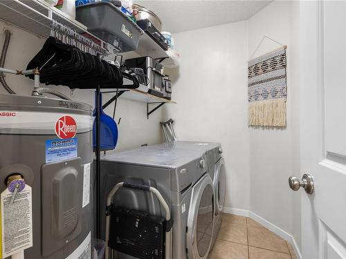 205-3089 Barons Rd, Nanaimo, BC - Indoor Photo Showing Laundry Room