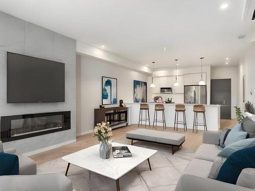 502-947 Whirlaway Cres, Langford, BC - Indoor Photo Showing Living Room With Fireplace