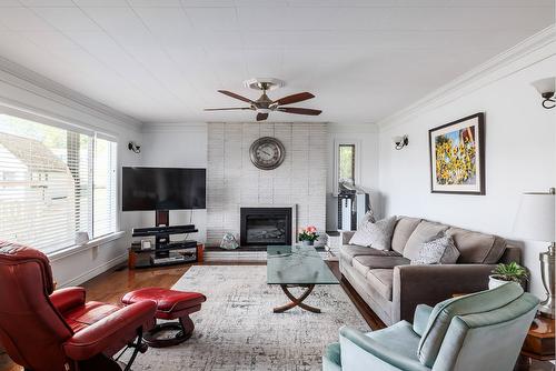 3083 Harwood Road, Lake Country, BC - Indoor Photo Showing Living Room With Fireplace