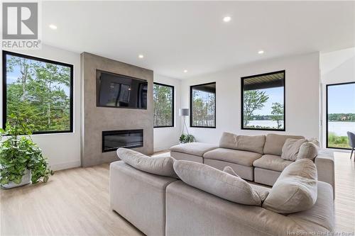 297 Pointe-A-Nicet Road, Grand-Barachois, NB - Indoor Photo Showing Living Room With Fireplace