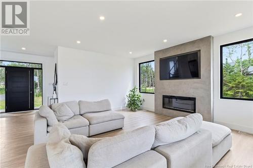 297 Pointe-A-Nicet Road, Grand-Barachois, NB - Indoor Photo Showing Living Room With Fireplace