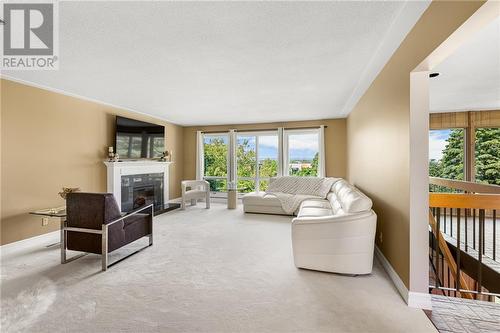 8 Fairway Boulevard, Riverview, NB - Indoor Photo Showing Living Room With Fireplace