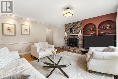 8 Fairway Boulevard, Riverview, NB - Indoor Photo Showing Living Room With Fireplace