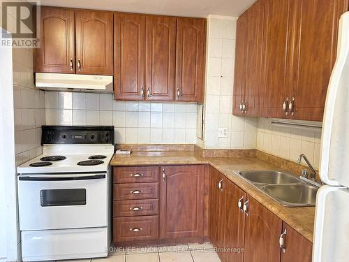 312 - 100 Leeward Glenway, Toronto, ON - Indoor Photo Showing Kitchen With Double Sink