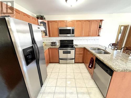 5175 Oscar Peterson Boulevard, Mississauga (Churchill Meadows), ON - Indoor Photo Showing Kitchen With Double Sink