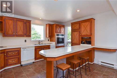 8150 Saint-Paul Street, Bas-Caraquet, NB - Indoor Photo Showing Kitchen With Double Sink