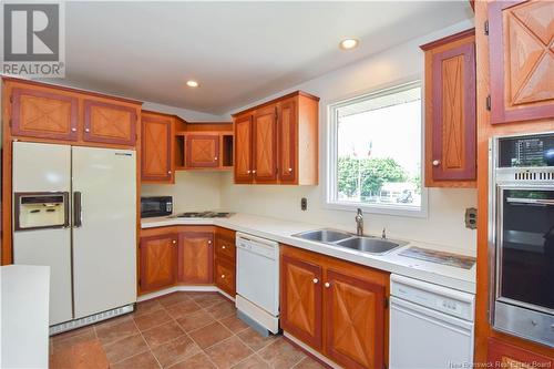 8150 Saint-Paul Street, Bas-Caraquet, NB - Indoor Photo Showing Kitchen With Double Sink