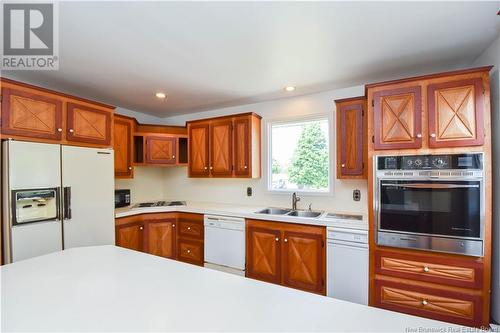 8150 Saint-Paul Street, Bas-Caraquet, NB - Indoor Photo Showing Kitchen With Double Sink