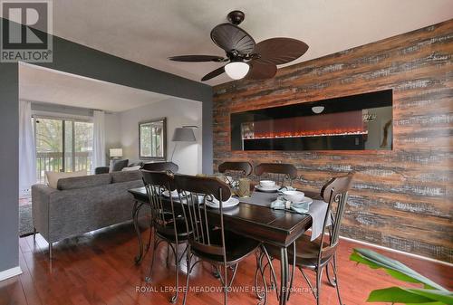 12 - 6780 Formentera Avenue, Mississauga, ON - Indoor Photo Showing Dining Room With Fireplace