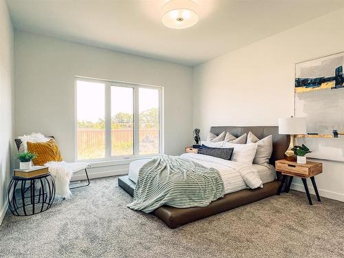 12 Clerihew Crescent, Oak Bluff, MB - Indoor Photo Showing Bedroom