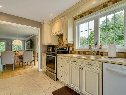 Kitchen - 720 Rue Garda, L'Épiphanie, QC - Indoor Photo Showing Kitchen With Double Sink