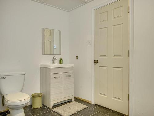 Powder room - 720 Rue Garda, L'Épiphanie, QC - Indoor Photo Showing Bathroom