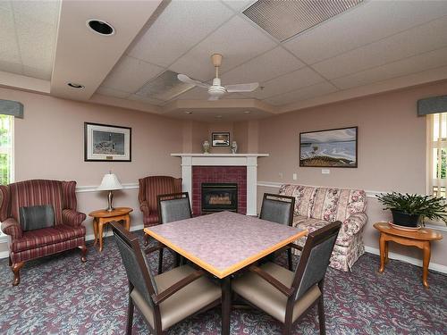 303-1683 Balmoral Ave, Comox, BC - Indoor Photo Showing Living Room With Fireplace