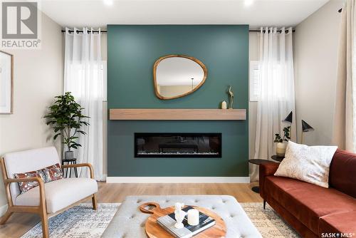 8641 Wheat Crescent, Regina, SK - Indoor Photo Showing Living Room With Fireplace